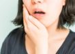 causes of receding gums