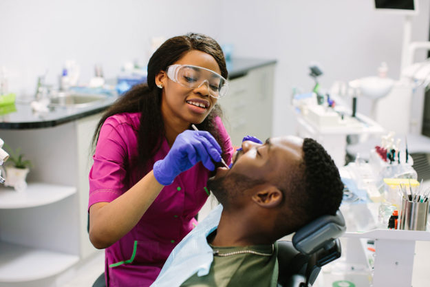 dental-exam-dental-visit-dental-appointment dental exam being conducted