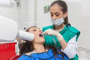 woman receives preventative dentistry 