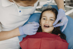 girl receiving pediatric dentistry services