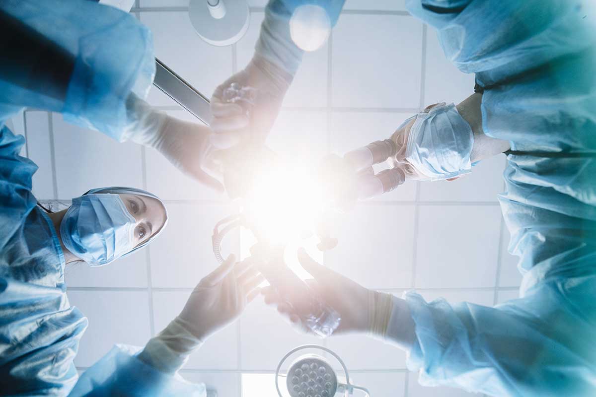 4-Common-Types-of-Oral-Surgeries a team of doctors perform oral surgeries